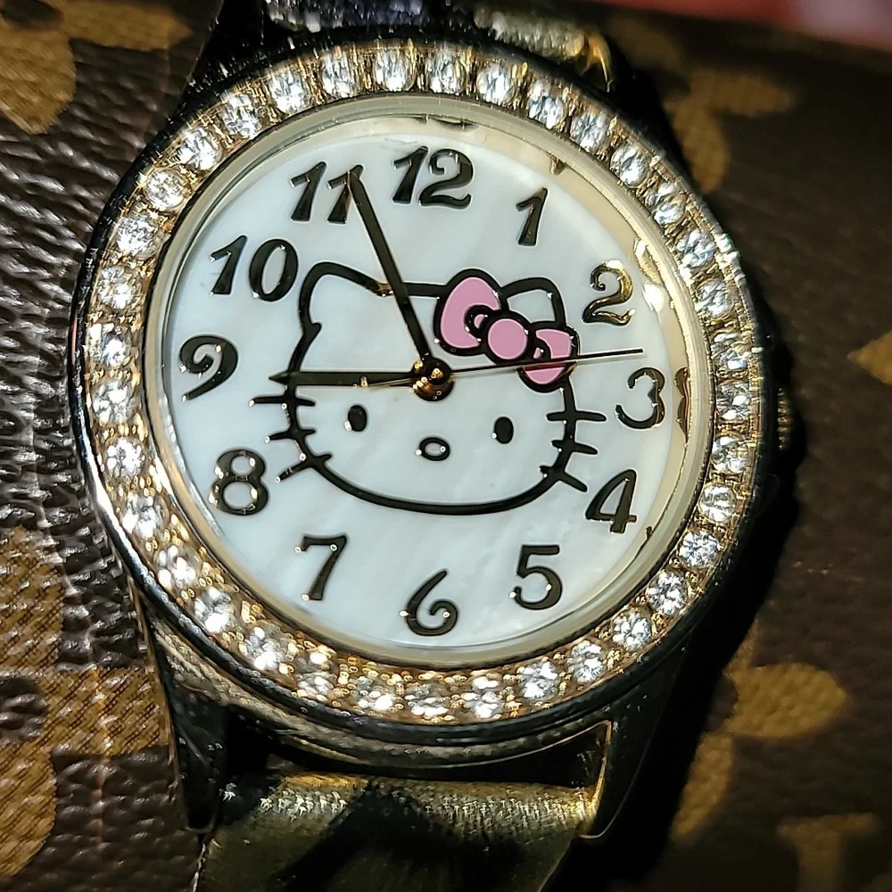 Sanrio Hello Kitty Gold Crystal Studded Bezel Leopard Print Band Textured Face‎